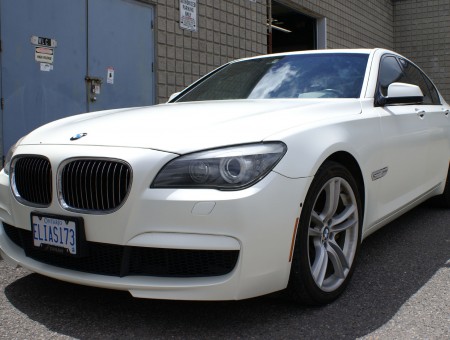 BMW 750 Satin Pearl White